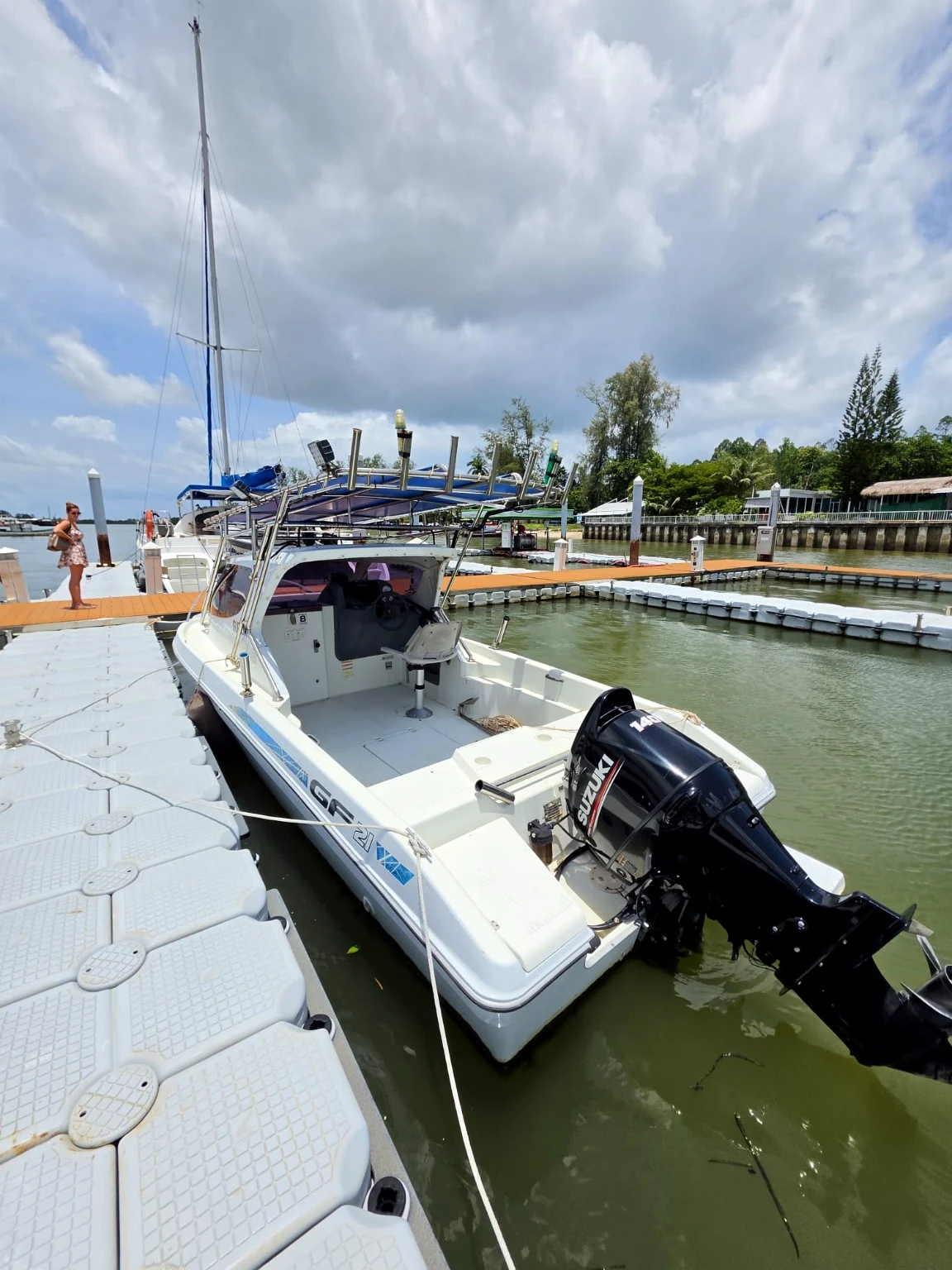 View the open aft deck and Suzuki outboard